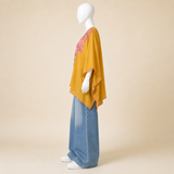 Mustard Gold short Kashmiri kaftan featuring intricate Aari-style machine work